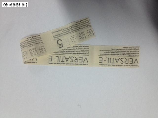 Etiqueta cortada y doblada en algod&oacute;n para vestidos