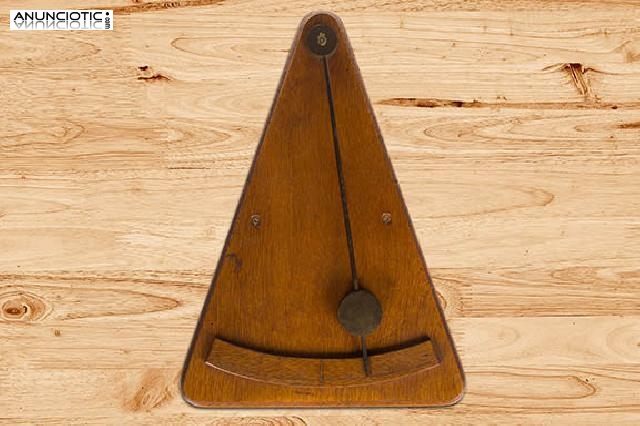 Clin&oacute;metro antiguo de madera