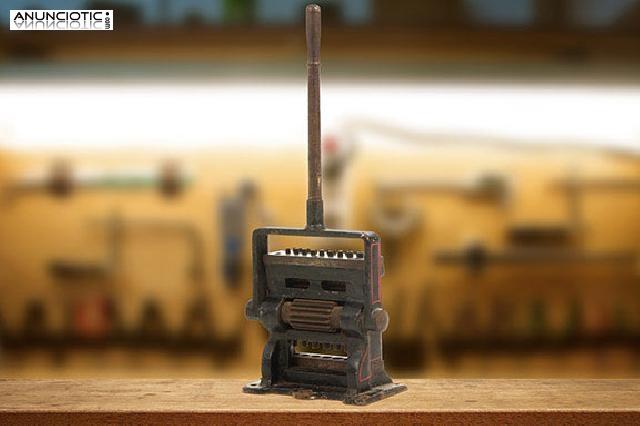 Troqueladora de oro. a&ntilde;os 20.