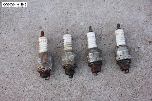 Champion. Juego cuatro buj&iacute;as.