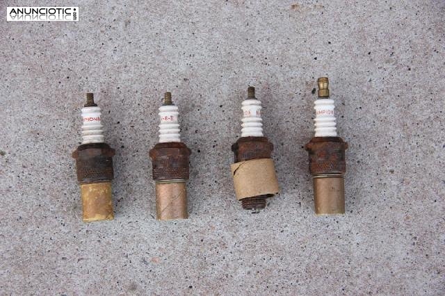 Champion. Cuatro buj&iacute;as.