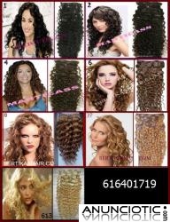 Extensiones clip quita/pon pelo natural rizado.69�.46cm largo, 7 capas.